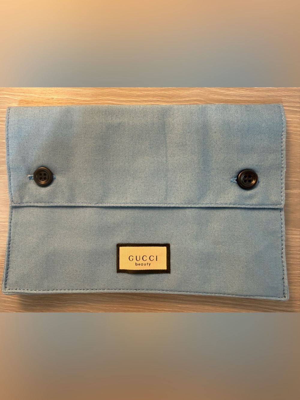 Gucci Pale Blue pouch with Dark Buttons